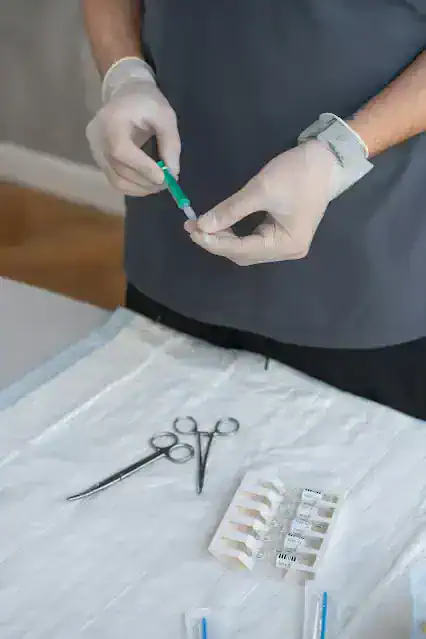 vet preparing injection syringe surgical tools animal treatment